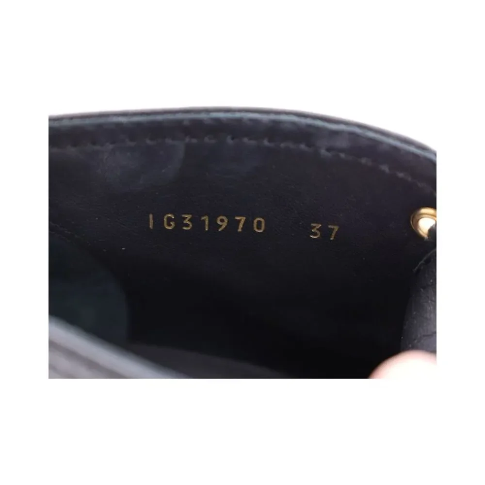 Reposhing - CHANEL Black Ankle Boots with Gold Accents - Picture 7 of 8